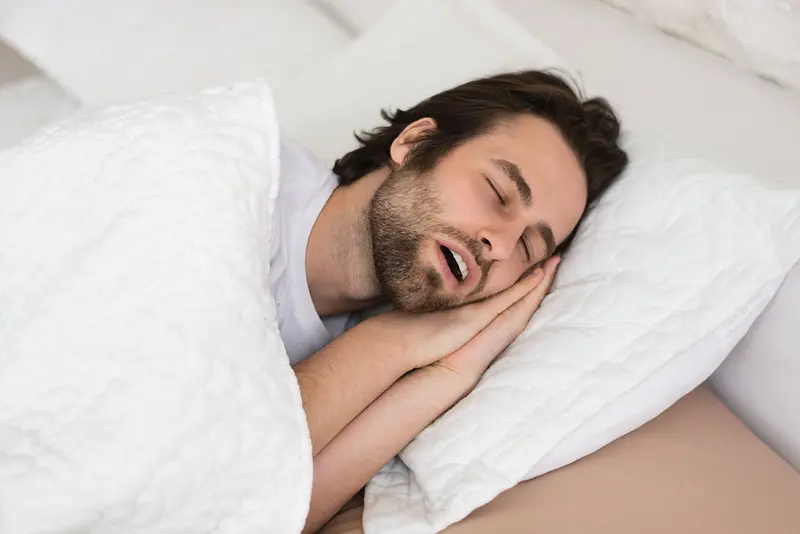 tired young caucasian male with open mouth sleepin 2023 11 27 05 01 42 utc Galway Dentists Home Galway Dentists